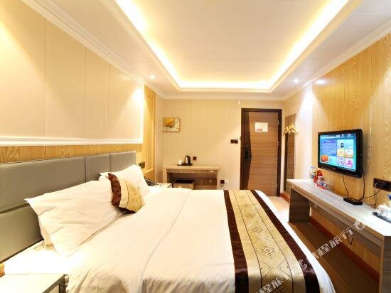 Suite Qi Hang Business Hotel