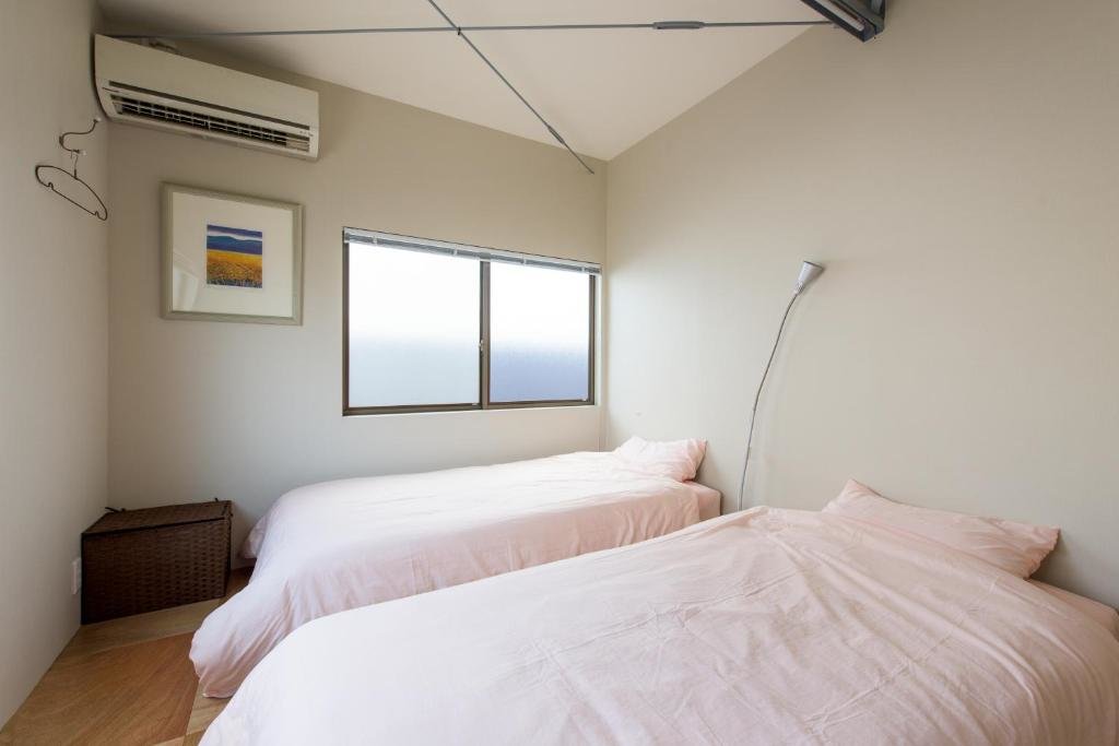 Cama en dormitorio compartido (dormitorio compartido femenino) GrapeHouse Koenji