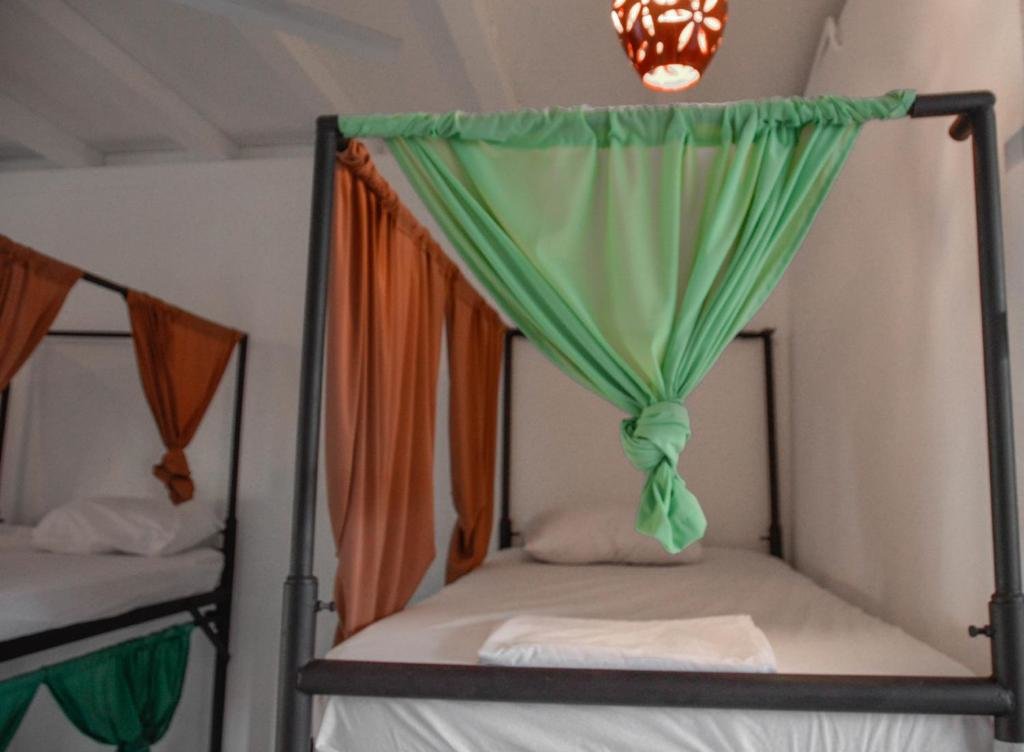 Кровать в общем номере Casa Oro Eco Hostel