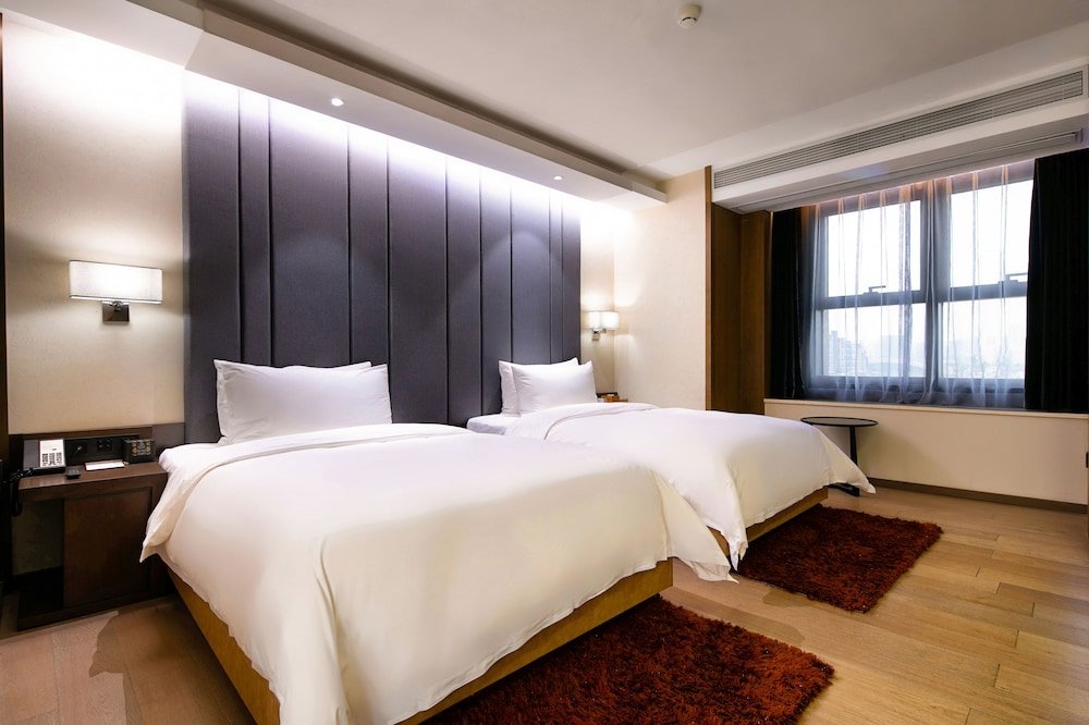 Suite Confort KuanRong Luxury Suites Hotel - Daping Times Square