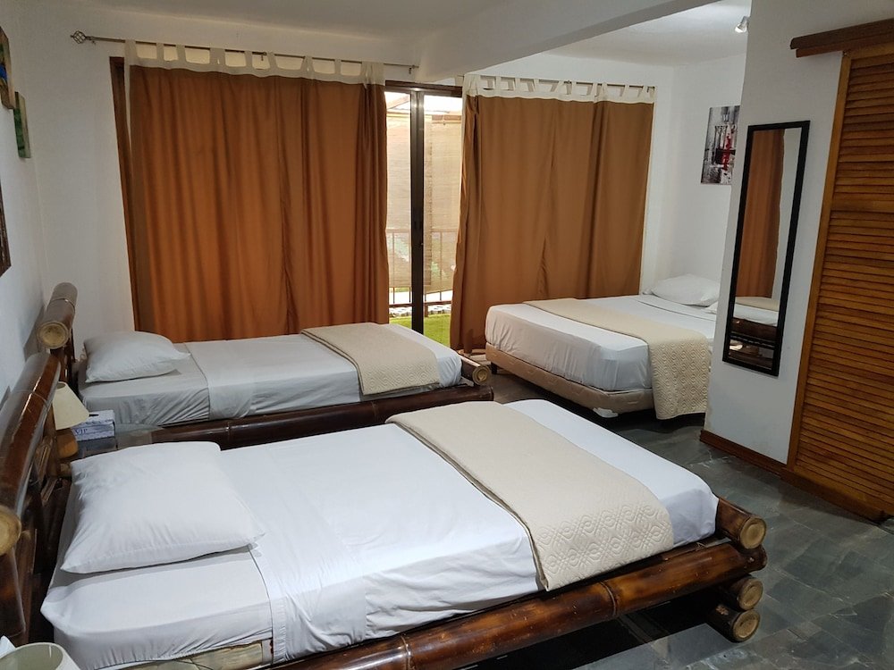 Standard quadruple famille chambre Bugabutik Hotel Resort