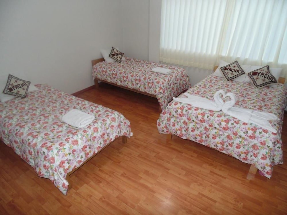 Standard quadruple chambre Puno Hostels