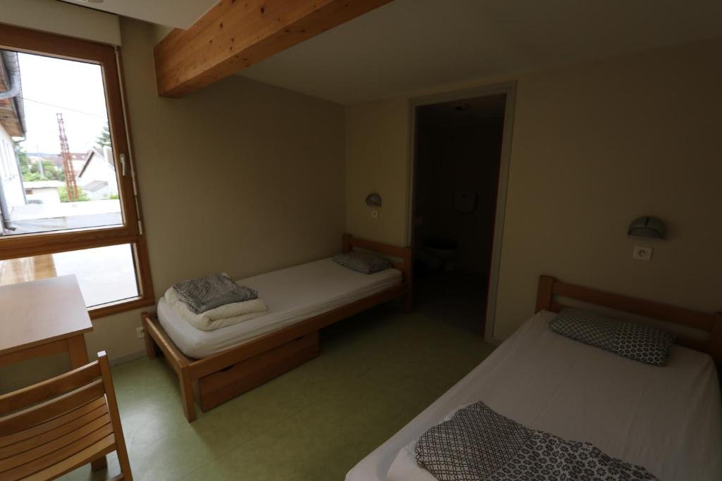 Кровать в общем номере (женский номер) Auberge de Jeunesse HI Pontarlier