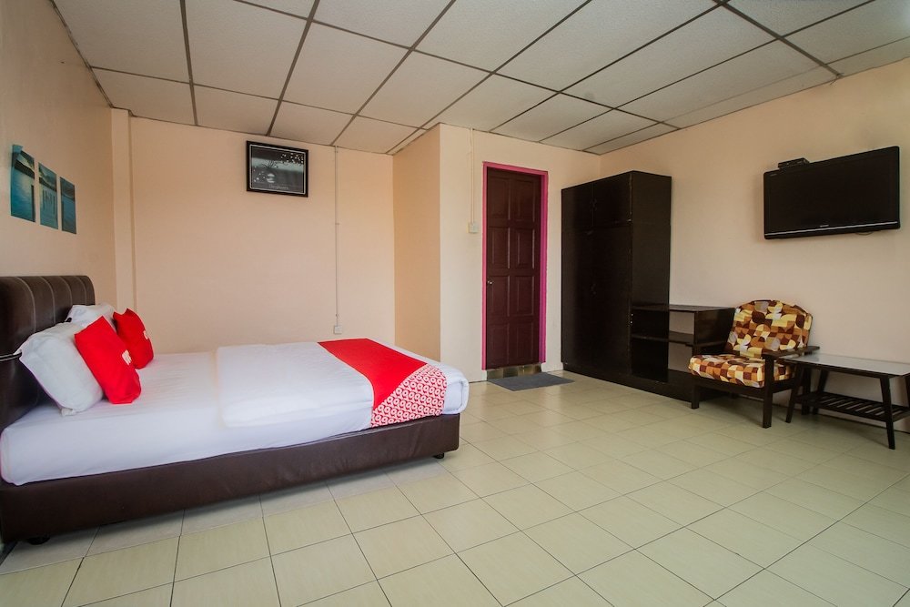 Habitación doble De lujo OYO 90124 Payang Puri Baru Hotel