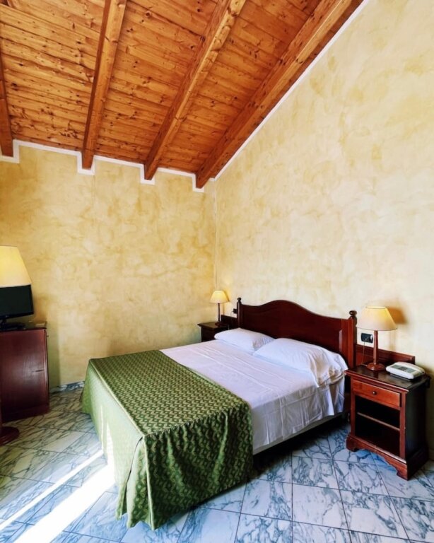 Standard quadruple chambre Hotel La Pigna
