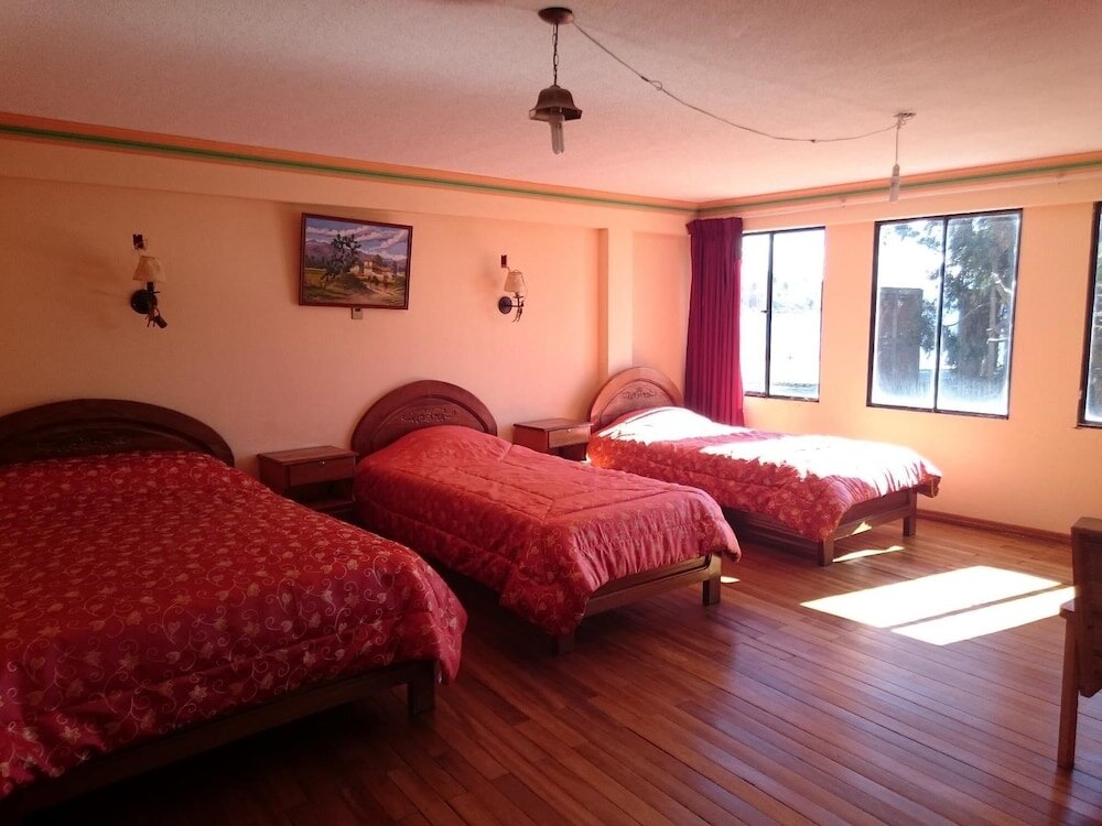 Четырёхместный семейный номер Standard Hostal Real los Andes del Lago