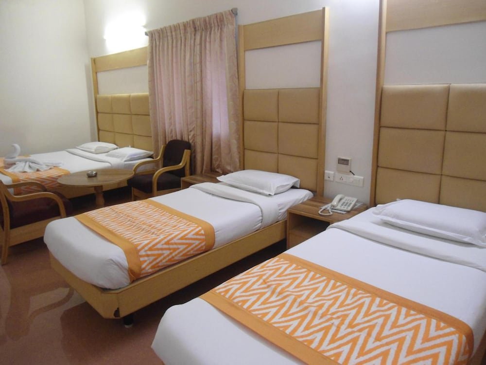 Standard quadruple chambre Hotel Rajadhane