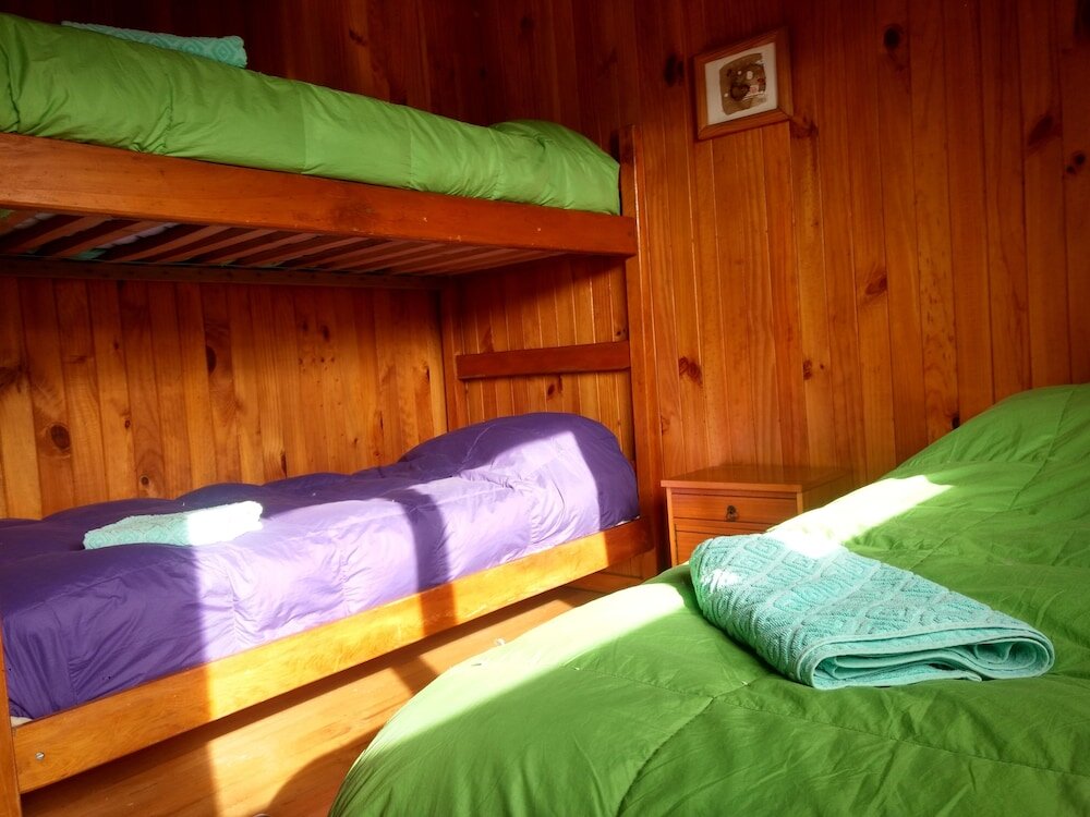 Кровать в общем номере Hostal Montaña