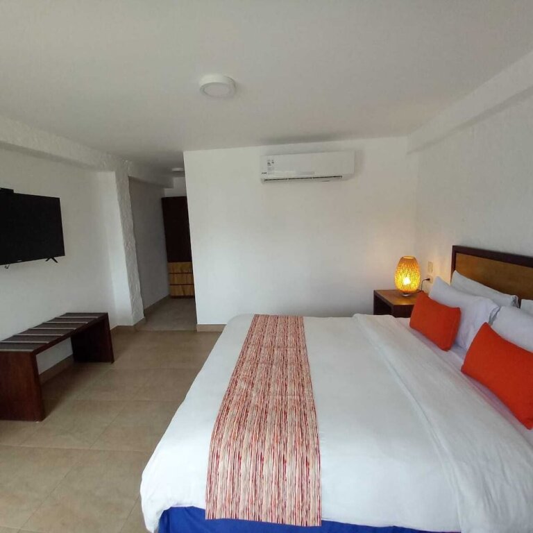 Standard Double room with balcony and with garden view Howard Johnson by Wyndham Montanita