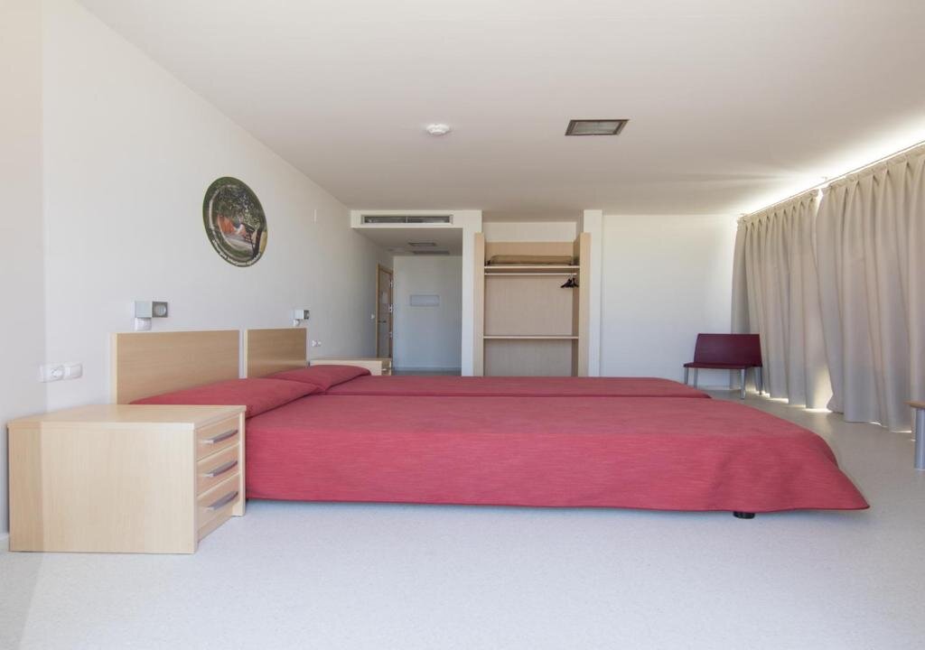 Кровать в общем номере Albergue Inturjoven Chipiona