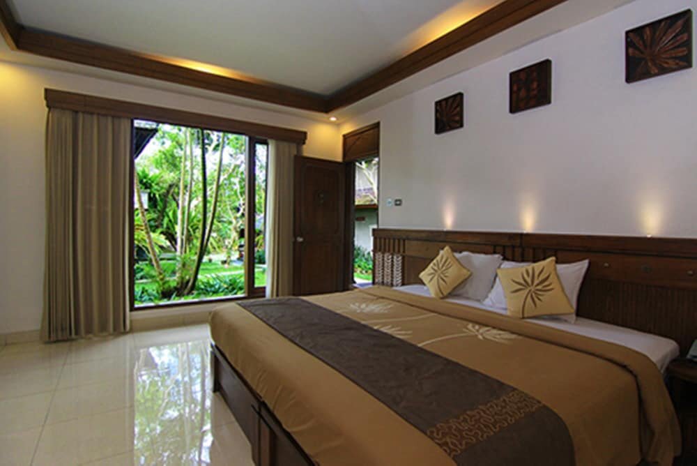 Номер Standard с балконом и с красивым видом из окна De Munut Balinese Resort