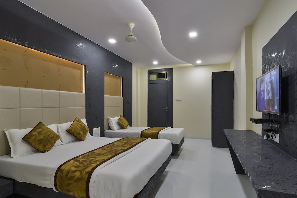 Трёхместный номер Deluxe Hotel Aroma- Dadar
