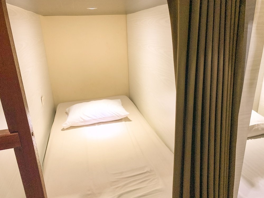 Кровать в общем номере (мужской номер) Omah Pelem Syariah