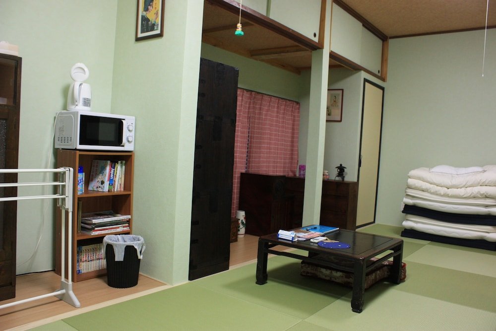 Cama en dormitorio compartido 5 habitaciones sótano Guesthouse Seiryuu Kibako - Hostel