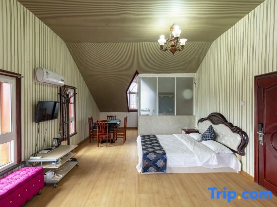 Bett im Wohnheim Dalian Taoyuan Leisure Holiday Hotel
