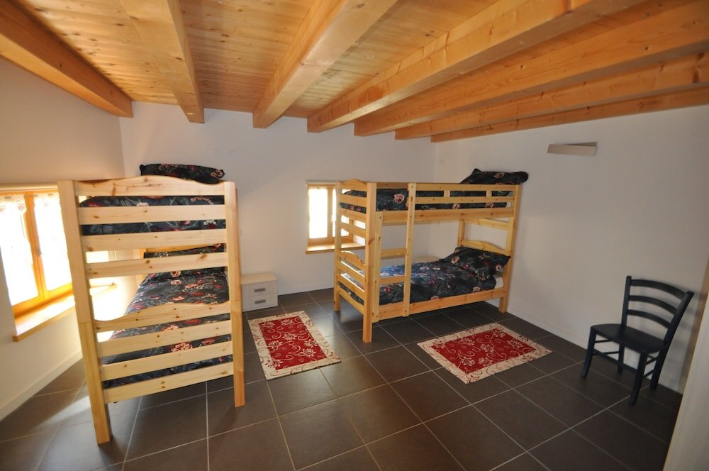 Кровать в общем номере Hostel Armonia & Community Museum