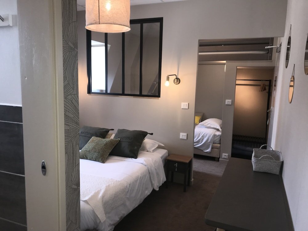 Comfort Quadruple room Cit'Hotel Les Alizes