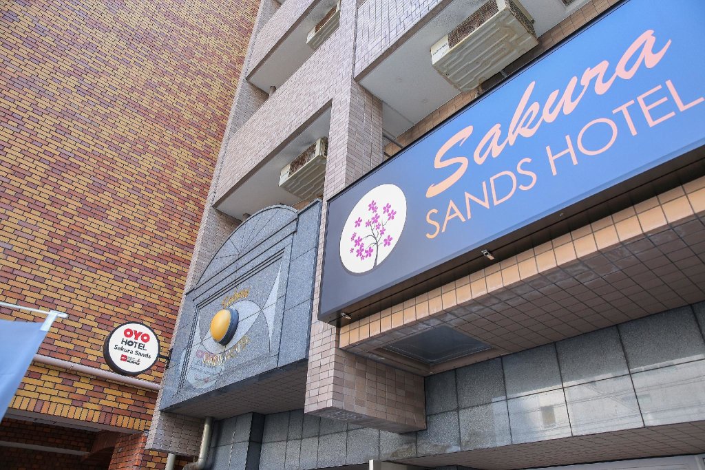 Cama en dormitorio compartido Sakura Sands Hotel