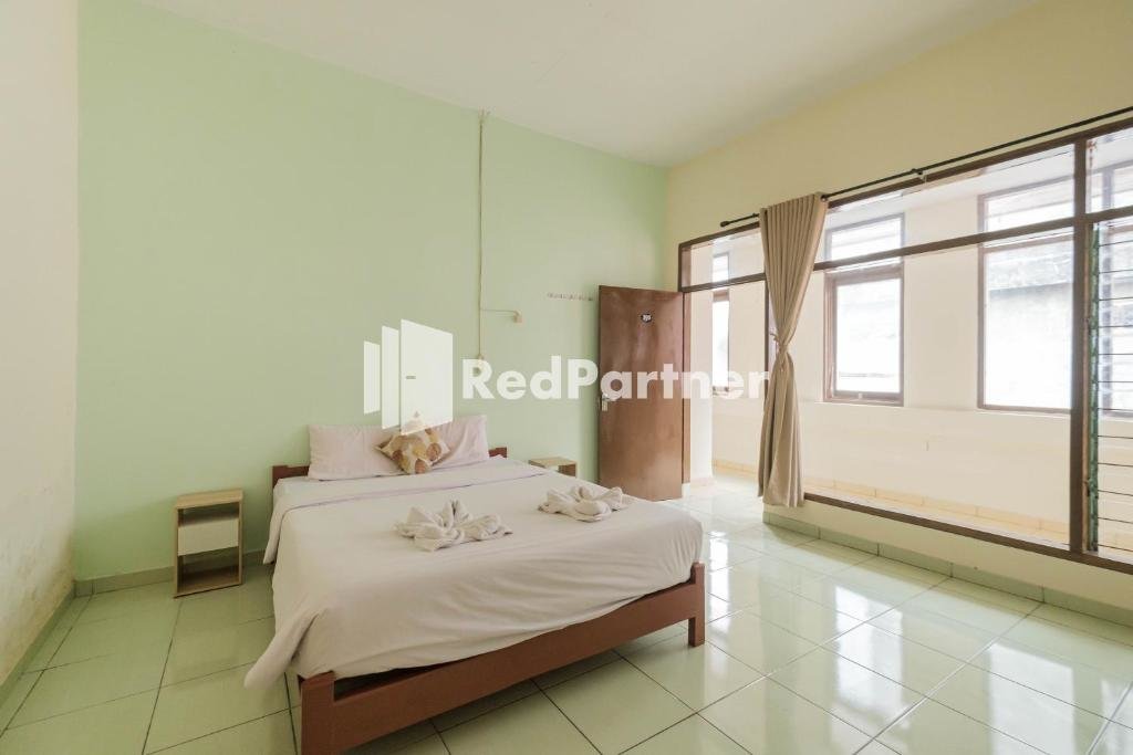 Deluxe double chambre Pondok Cahaya Panorama Mitra RedDoorz