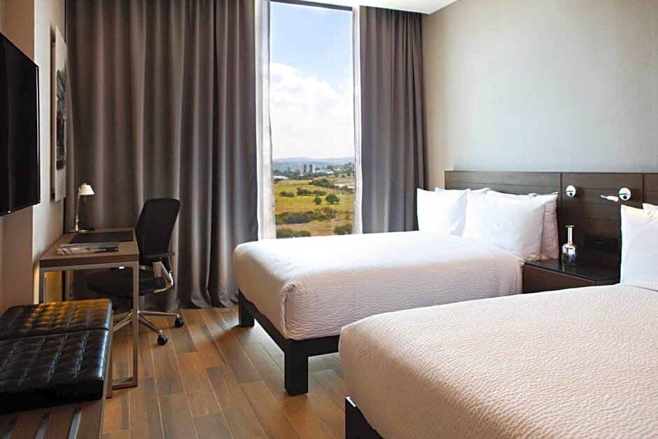 Standard Quadruple room AC Hotel by Marriott Queretaro Antea