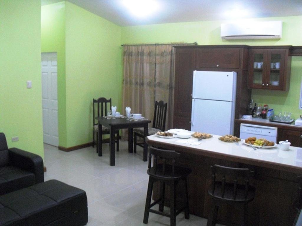 Апартаменты Piarco Village Suites