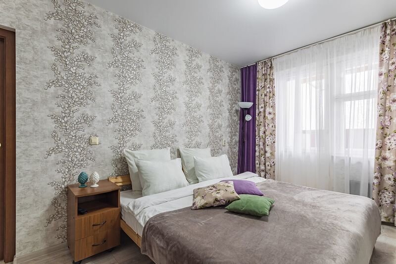 Cama en dormitorio compartido 2 dormitorios Strelka 6 Apartments