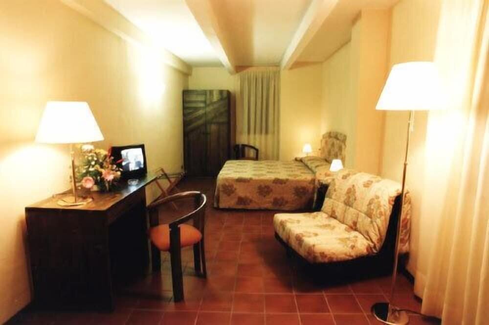 Standard Quadruple room Hotel La Rocca