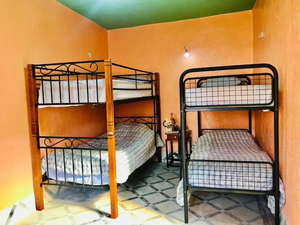Кровать в общем номере Downtown Fez Hostel