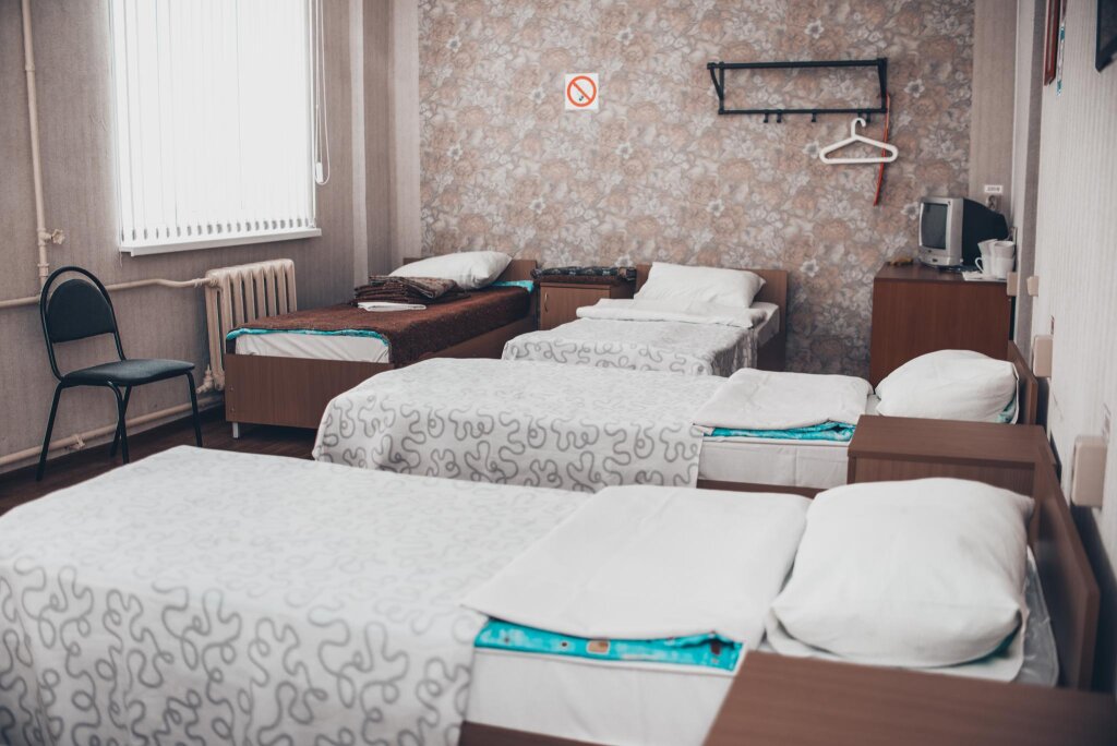 Кровать в общем номере Апарт-отель Солнечный