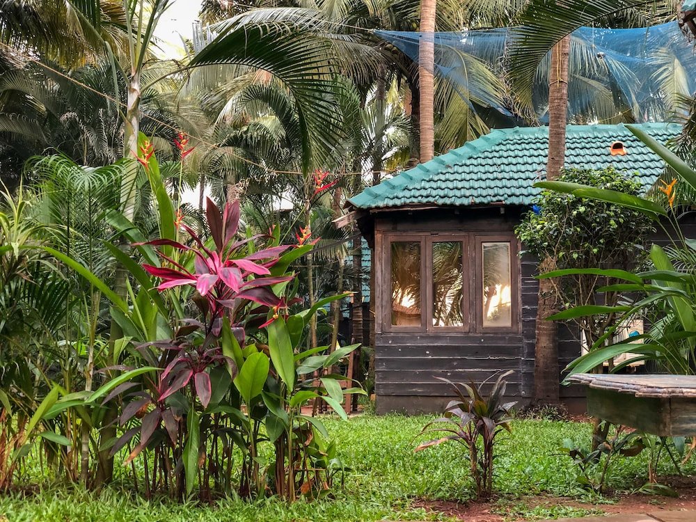 Коттедж Luxury с видом на сад Leela Cottages