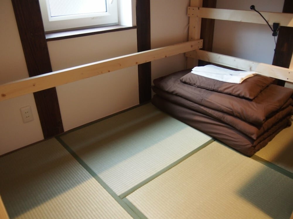 Кровать в общем номере (мужской номер) Tototo Morioka