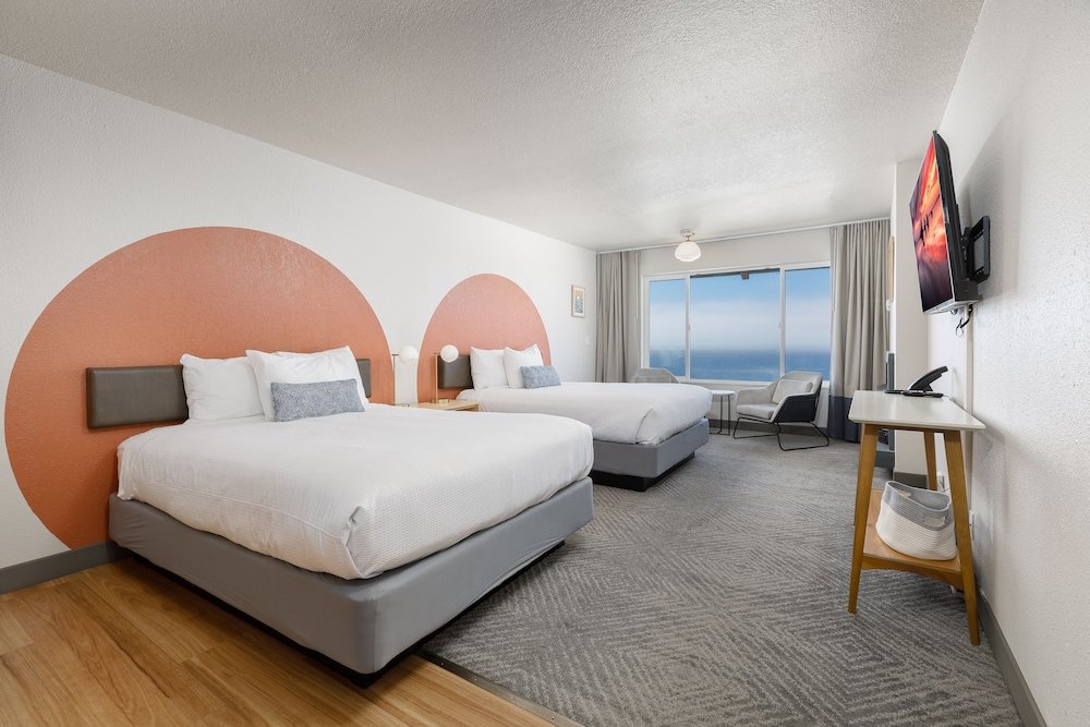 Четырёхместный номер Deluxe с видом на океан Surfland Hotel