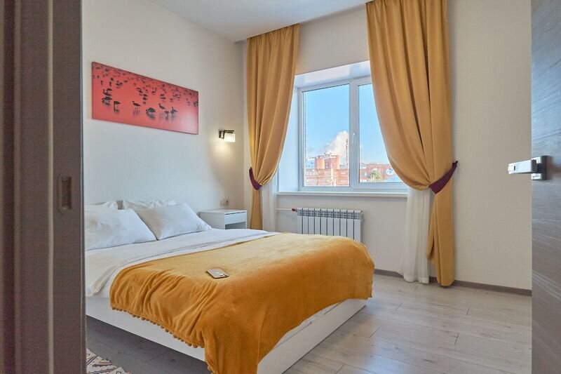 Кровать в общем номере с 2 комнатами Апартаменты Петровские