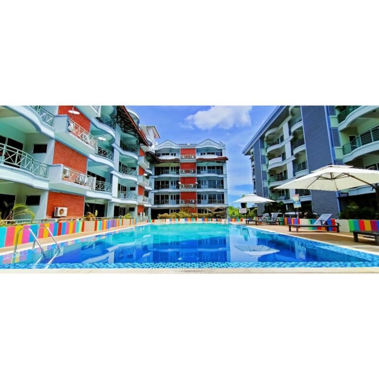 Кровать в общем номере с 2 комнатами Perdana Serviced Apartment & Resorts