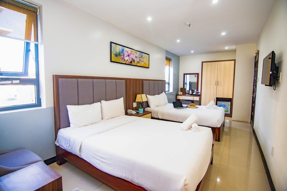 Четырёхместный номер Superior Quoc Cuong Center Da Nang Hotel by Haviland