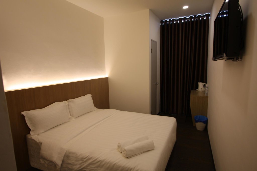 Кровать в общем номере Place2Stay Business Hotel @ Metrocity