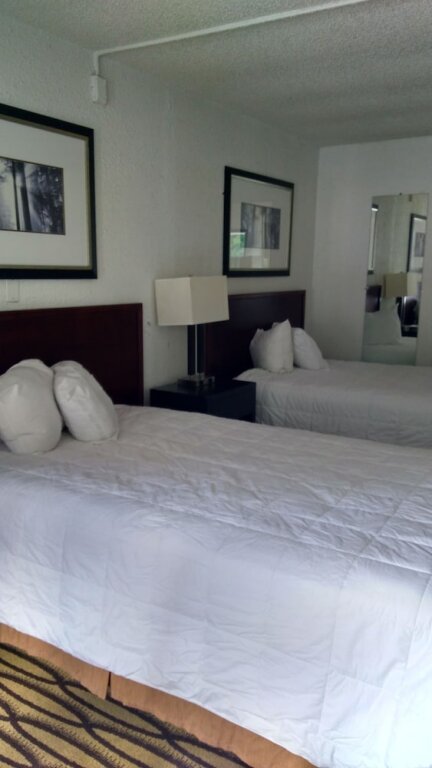 Standard quadruple chambre Affinity Inn and Suites