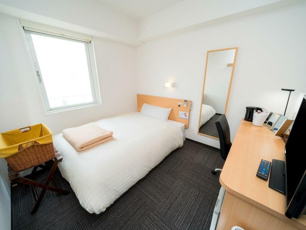Кровать в общем номере (женский номер) Super Hotel Kokuraeki Minamiguchi