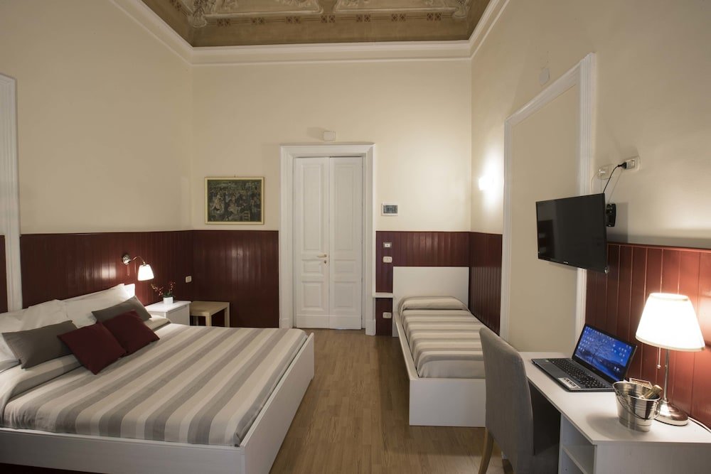Confort triple chambre avec balcon Dimora Novecento