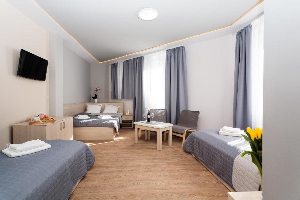 Standard Vierer Zimmer Apartamenty Platinia - komfortowe noclegi Kraków Stare Miasto