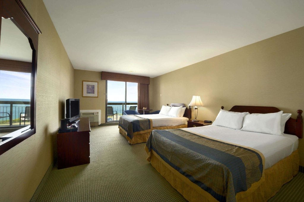 Standard Vierer Zimmer Ramada by Wyndham Jordan/Beacon Harbourside Resort