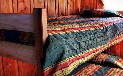 Кровать в общем номере Hostal Klaus