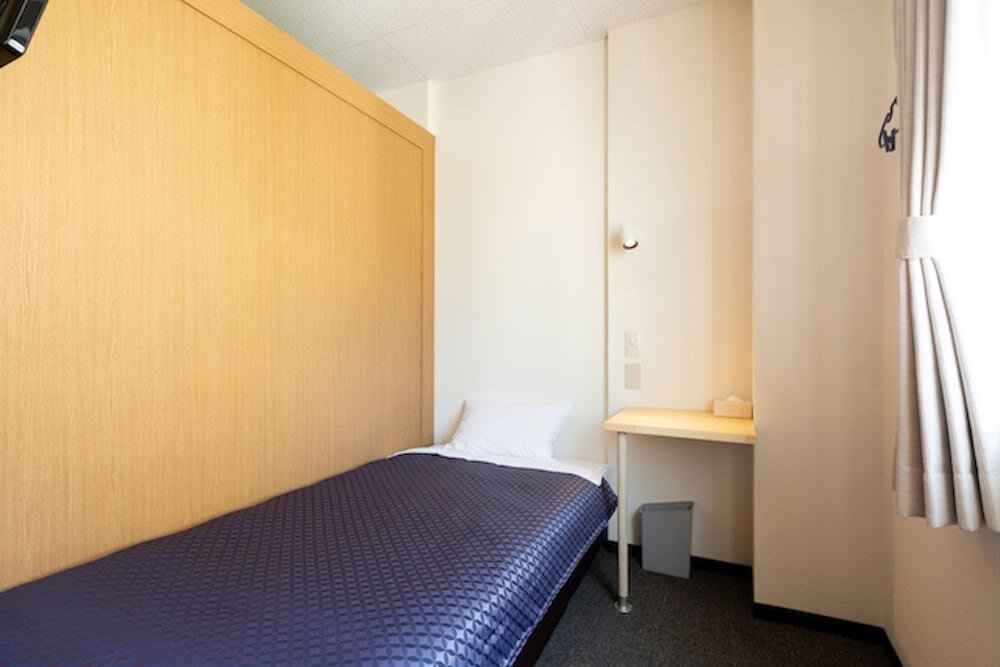 Cama en dormitorio compartido (dormitorio compartido masculino) Cabinet Hotel WOWS
