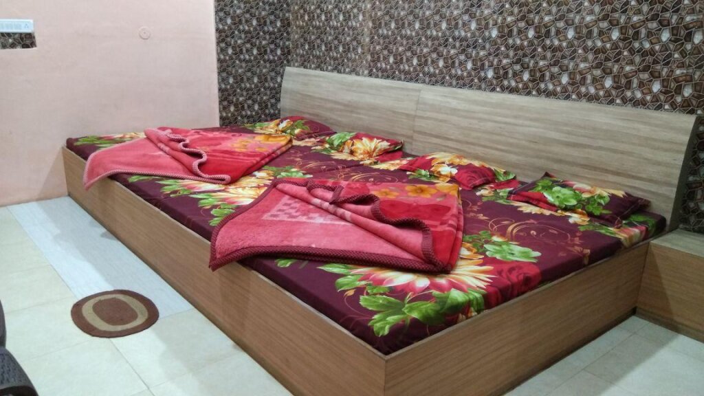 Кровать в общем номере Hotel parikalp New