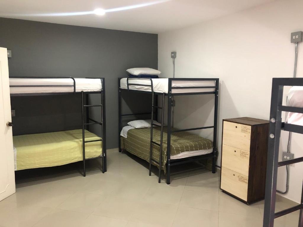 Кровать в общем номере Black Sheep Medellin
