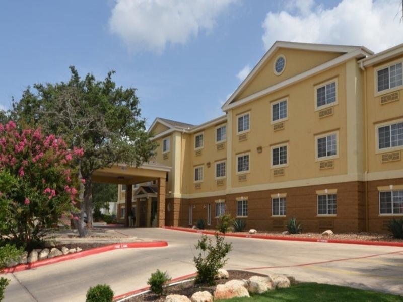 Кровать в общем номере Holiday Inn Express Hotel & Suites San Antonio-Airport North, an IHG Hotel