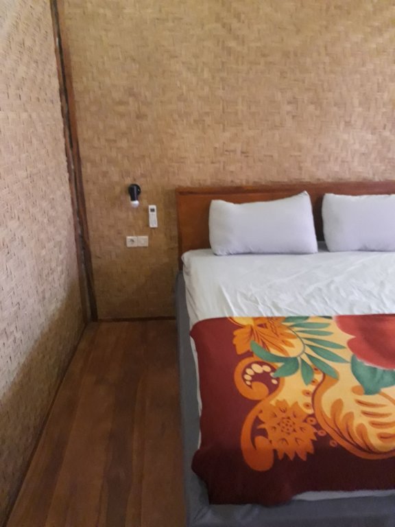 Économie double chambre Menjangan Hostel