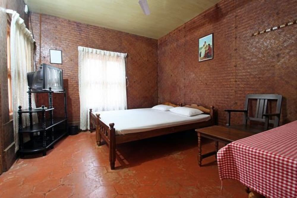 Cama en dormitorio compartido Pranav Beach Resort