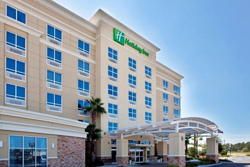 Кровать в общем номере Holiday Inn - Gulfport-Airport, an IHG Hotel