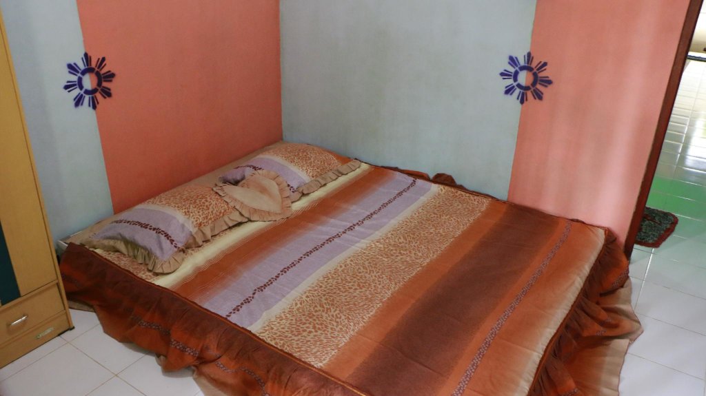 Кровать в общем номере (мужской номер) Omah Kemiri 6 Yogyakarta